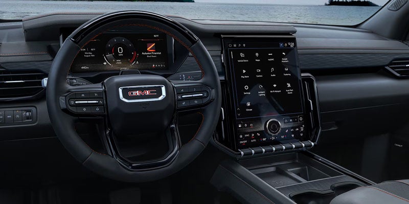 2026 GMC Acadia interior display featuring advanced infotainment system with digital controls and connected features.