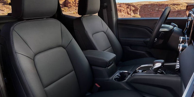 2026 GMC Canyon premium interior featuring leather-appointed front seats and center console