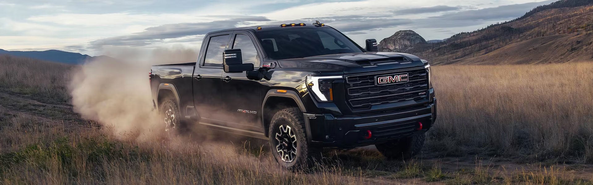 2026 GMC Sierra 2500 HD Hero image showing a powerful heavy-duty pickup truck in an outdoor setting