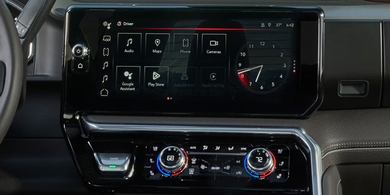 2026 GMC Sierra 2500 HD infotainment touchscreen displaying navigation and connectivity features.